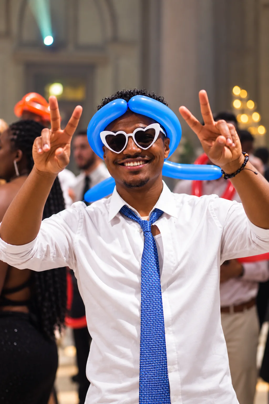 Wedding guest celebrating in playful glasses